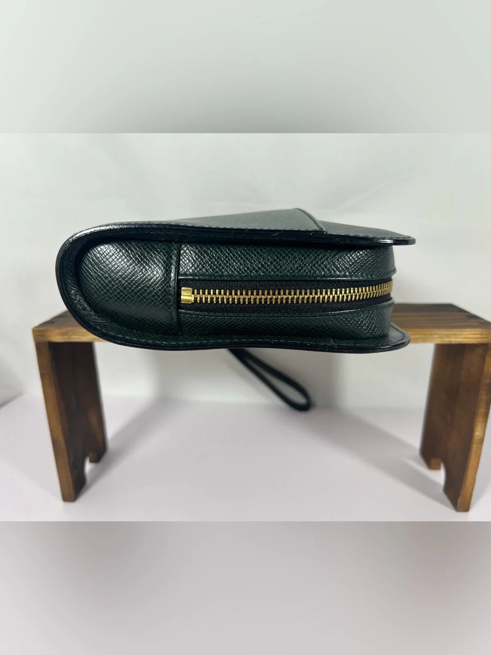 7101: Louis Vuitton Taiga Baikal Wristlet Clutch Pouch Green